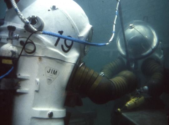 Two JIM suit divers in the tank at HMNB Rosyth